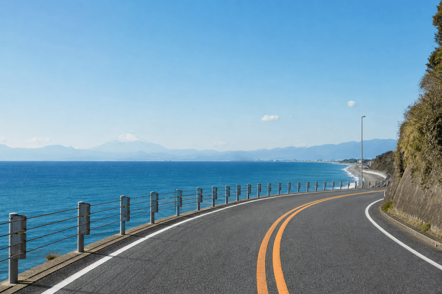A scenic coastal driving road along the Shonan coast of Japan